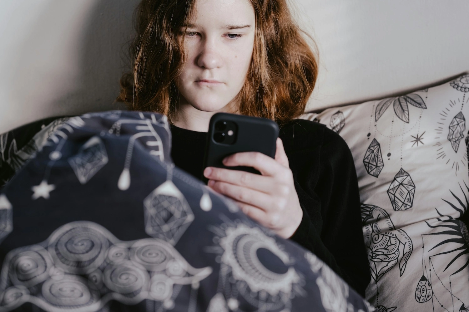 Teen using phone